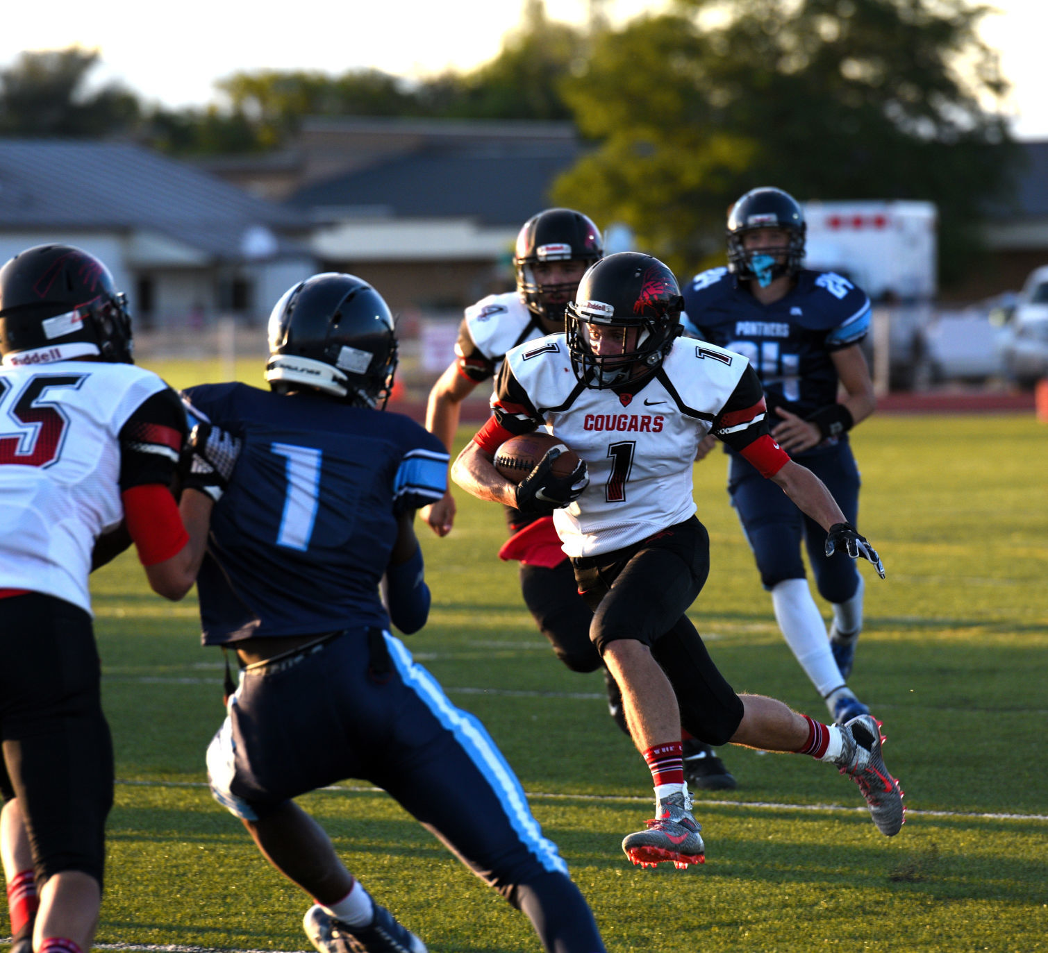 South Fremont wide receiver Dallin Orme runs through a crowd of West Jefferson defenders. South clobbered West J 63-14 Friday. (copy)